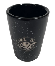 Bison black ceramic shot glass with etched primary logo and white speckles.