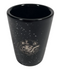 Bison black ceramic shot glass with etched primary logo and white speckles.